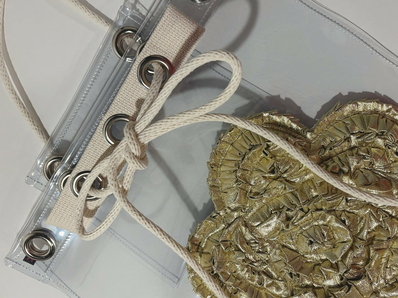 PVC VINYL x SOLID-DECORATION METALLIC FLOWER DRAWSTRING BAG Studio Stars